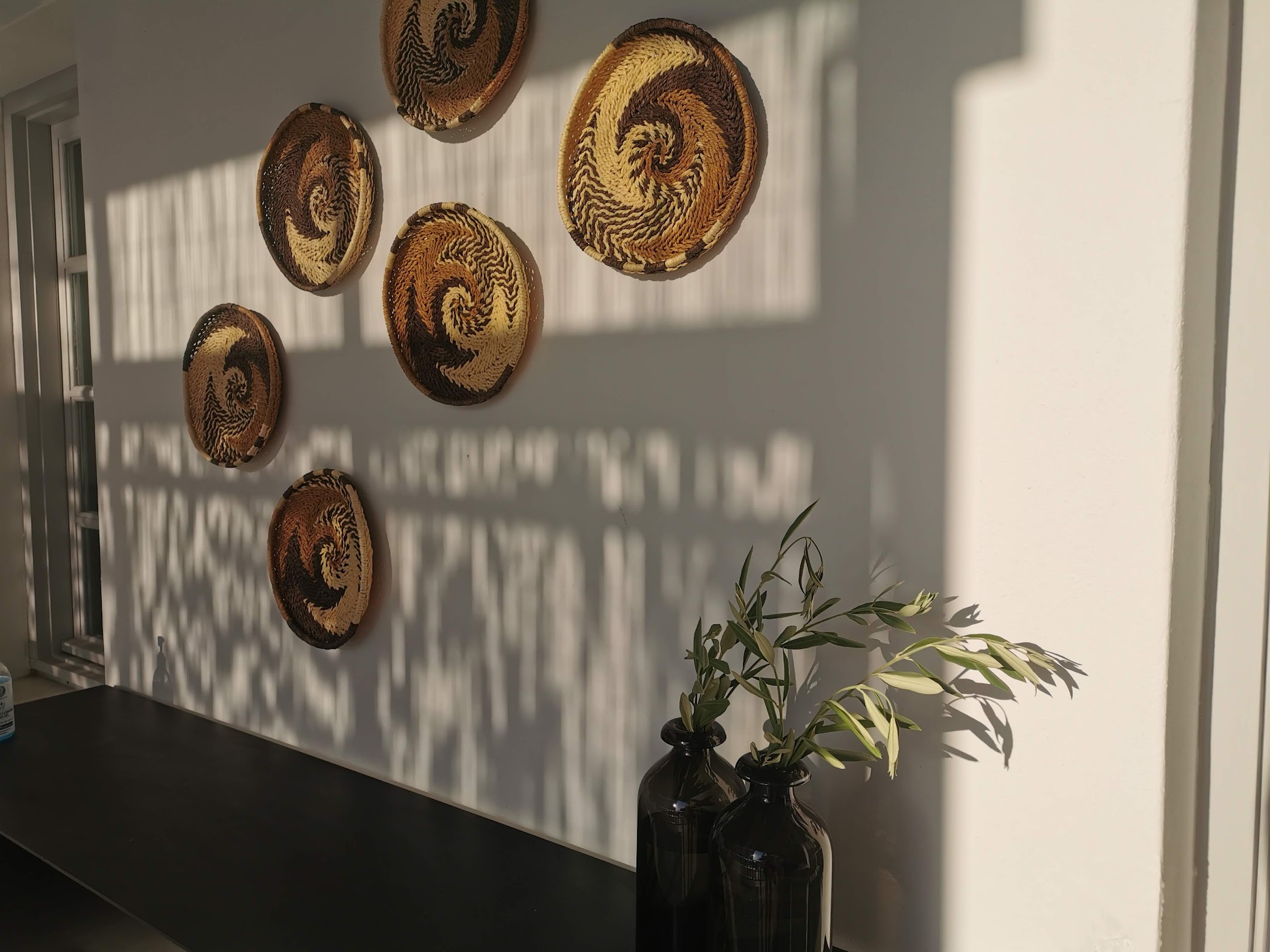 simple seagrass baskets on a wall